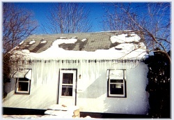 This Home Has Major Ice Dams That Are Blocking The Front Entrance To The Home ~ Click for larger image