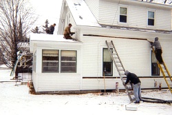 Houle Insulation Crew Installing Sidewall Cellulose Insulation On An Existing Older Home ~ Click for larger image