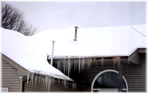 Major Ice Dams Formed Along Roofline