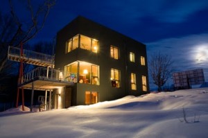 The Passive House at night © Corey Gaffer